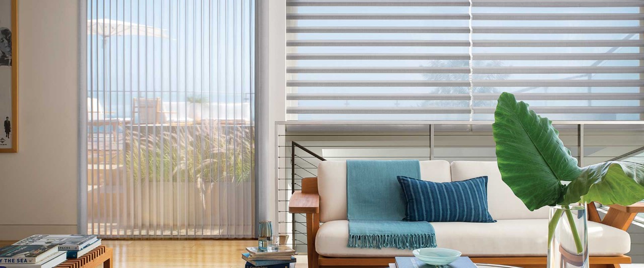 Living room loft with Pirouette an Luminette window coverings.